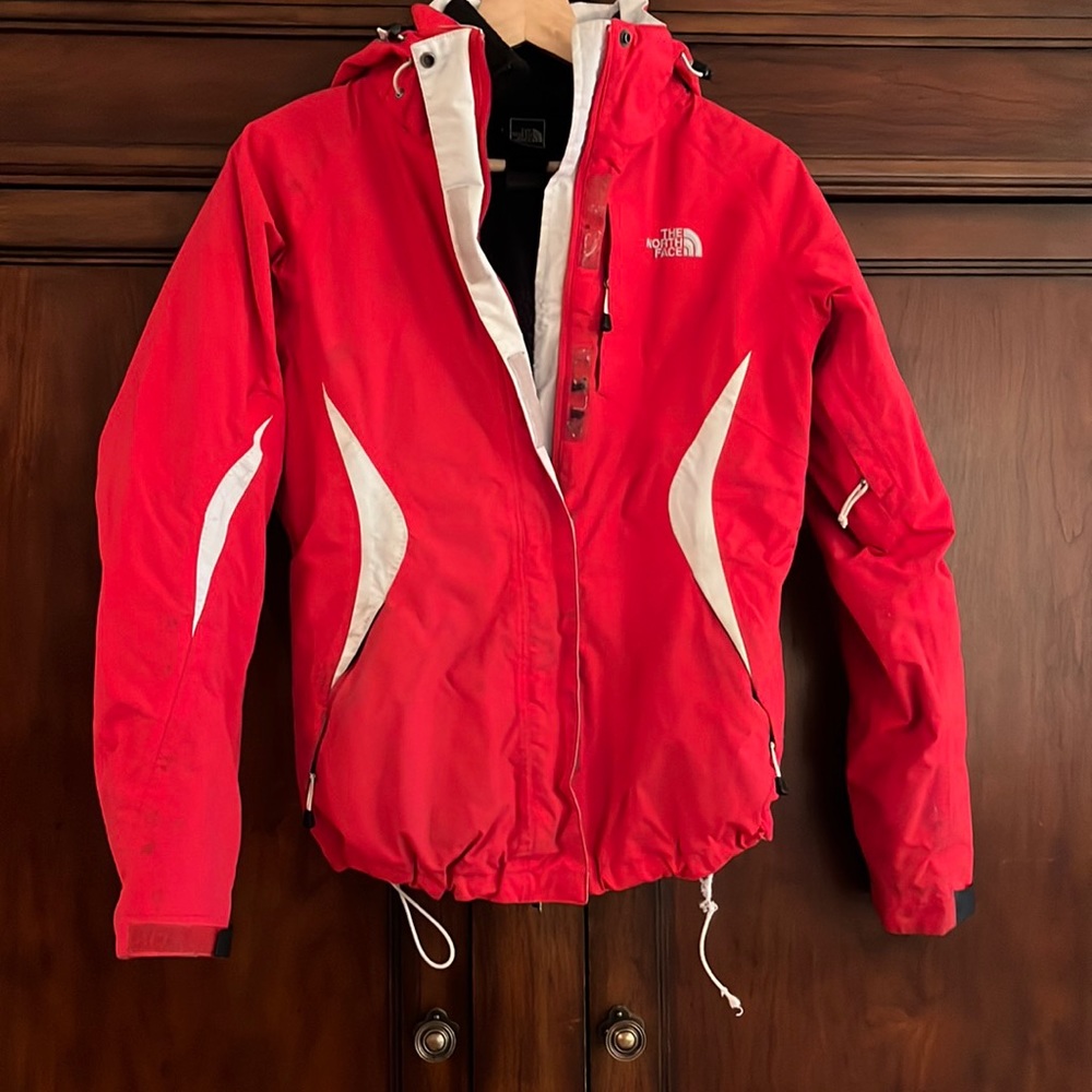 Bright red Northface jacket with removable fleece lining